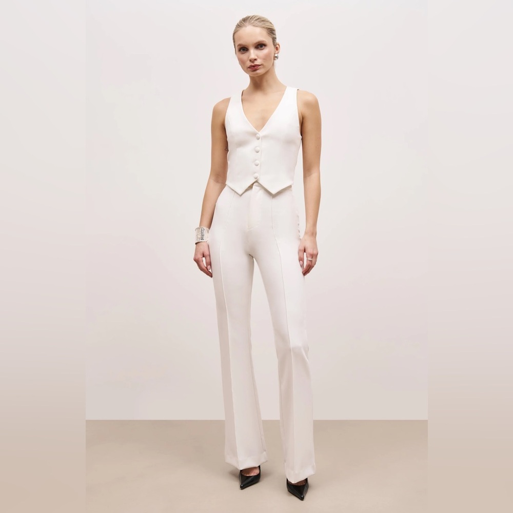 boa. Wide leg suit trousers. White. Size Medium.